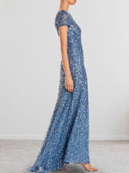 Vestido largo de madre de la novia con escote redondo y lentejuelas en azul polvoriento