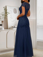 Vestido de tul con lentejuelas y escote redondo de sirena en azul marino oscuro