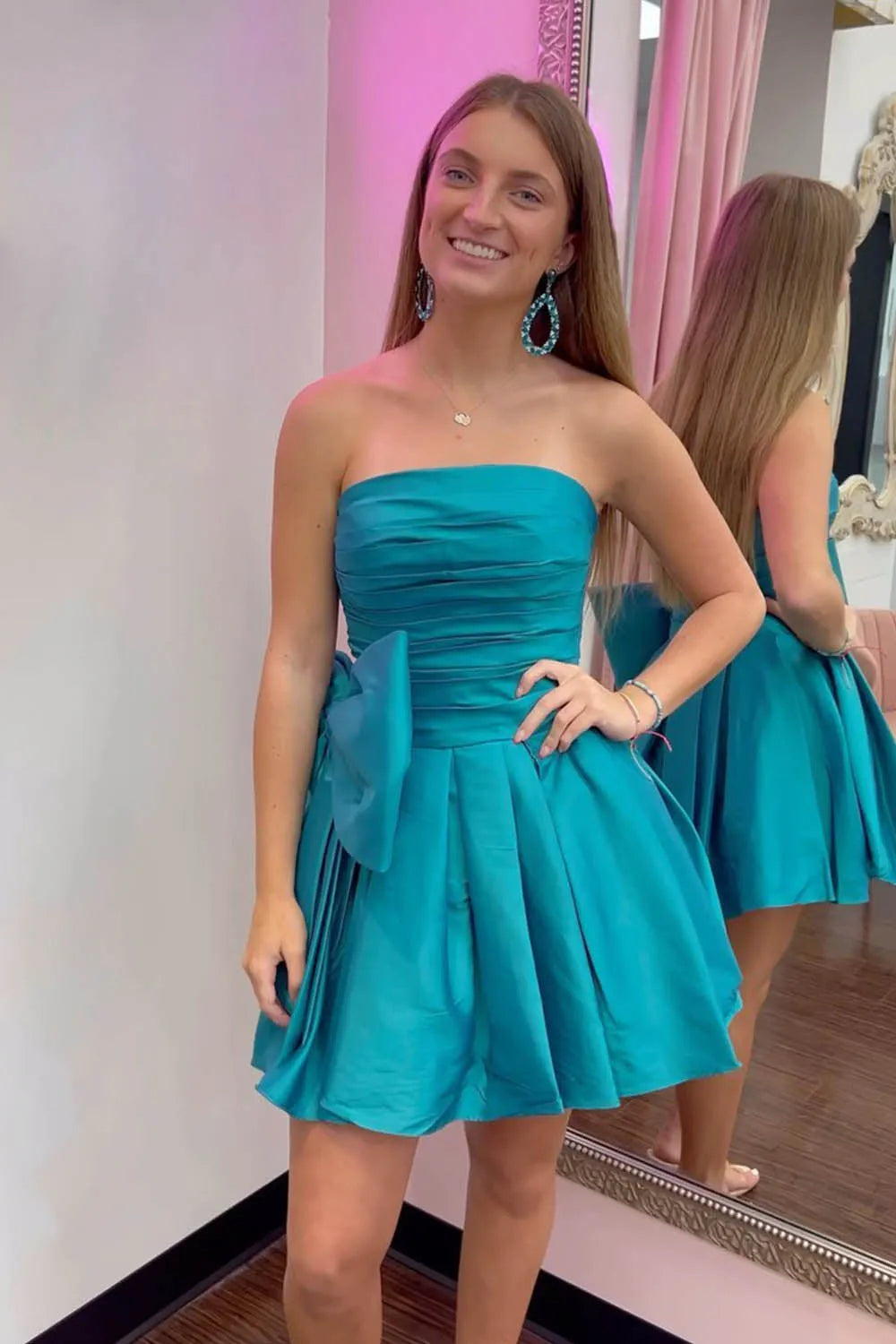 Fern | A-Linien-Partykleid ohne Träger und mit Plissee und Schleife