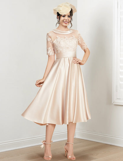 Vestidos de madre de la novia de corte A/princesa con escote redondo y largo hasta la rodilla