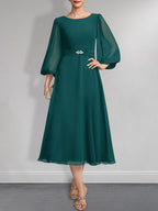 Vestido de gasa para madre de la novia, corte A, escote redondo, largo hasta la rodilla, plisado, con broche de cristal