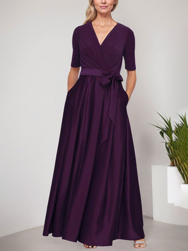 Vestido de gala con escote cruzado, falda de satén y corpiño de jersey