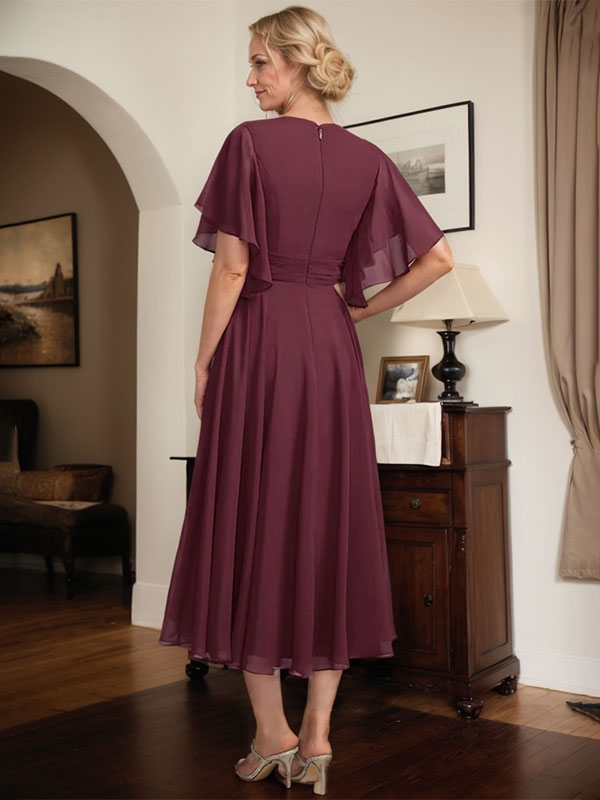 Vestido de gasa para madre de la novia con escote en V, corte A y largo hasta la rodilla, con cuentas plisadas