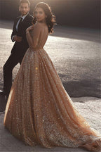 Glamoroso vestido de fiesta largo de tul con lentejuelas y volantes en corte A dorado