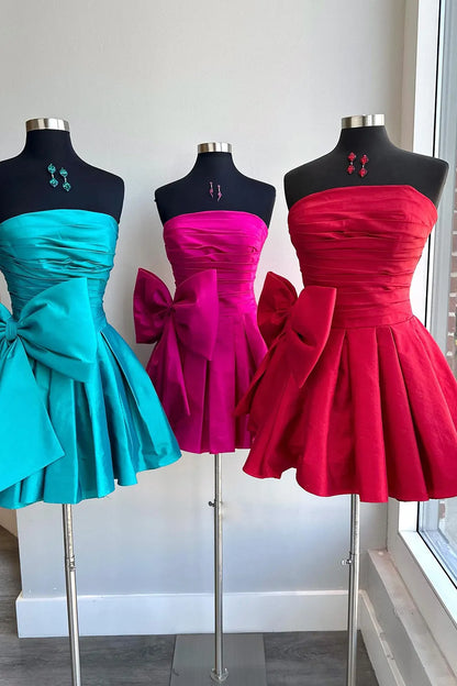Fern | A-Linien-Partykleid ohne Träger und mit Plissee und Schleife