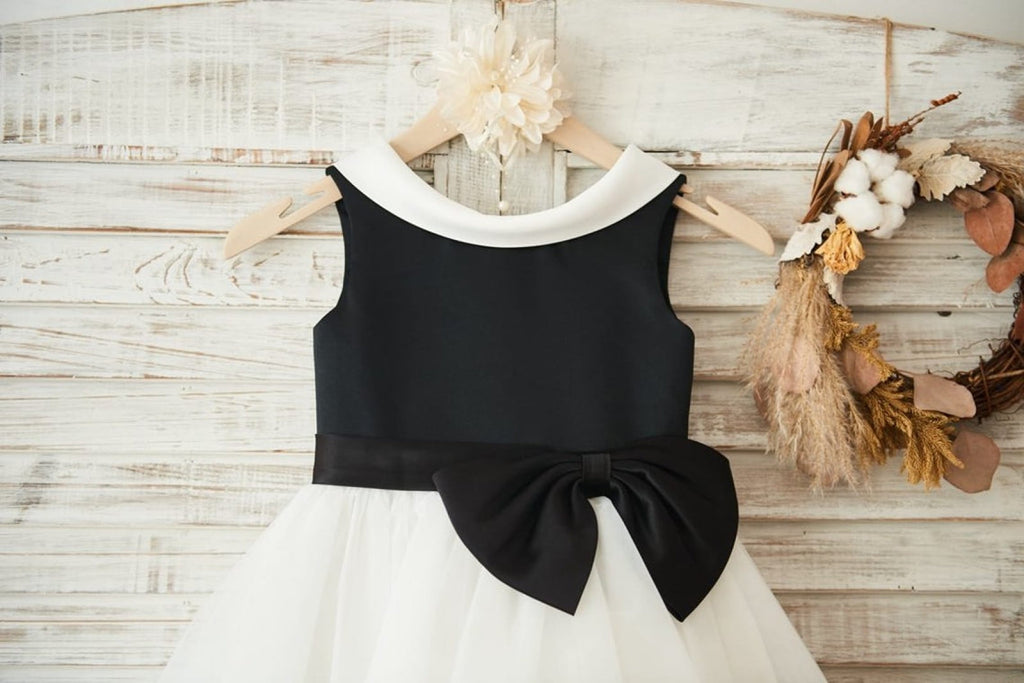 Knielanges schwarzes Blumenmädchenkleid aus Satintüll 
