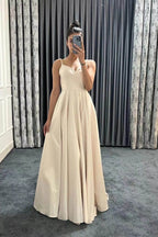 Vestidos de fiesta largos de corte A con tirantes finos, escote en V, sin mangas y con bolsillos