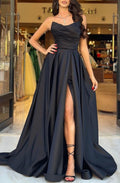 Elegante vestido de fiesta negro largo de corte A sin mangas y sin tirantes con abertura