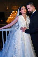 Vestido de novia de tul con escote en V, sin mangas, corte A y apliques hasta el suelo
