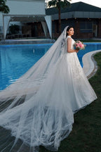 Vestido de novia de tul con escote en V, sin mangas, corte A y apliques hasta el suelo