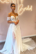 Vestidos de novia de tul con escote en forma de A, hombros descubiertos y largo hasta el suelo con apliques