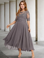 Vestidos de madre de la novia de corte A/princesa con escote redondo y largo hasta la rodilla