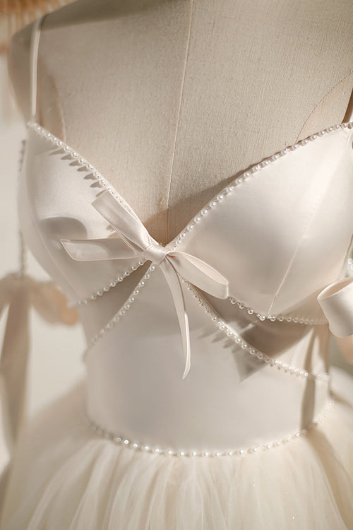 Vestidos de fiesta cortos elegantes con lazo y cuentas y cordones