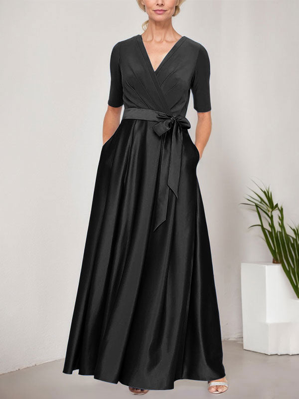 Vestido de gala con escote cruzado, falda de satén y corpiño de jersey