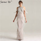 Schwarz Neckholder Backless Sexy Luxus Abendkleider 2025 Quaste Perlen Ärmellose Meerjungfrau Abendkleid LA6229 
