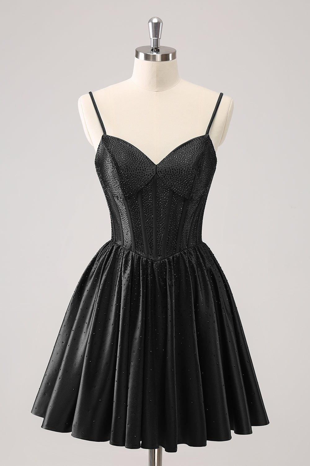 Vestido corto verde oscuro con tirantes finos, volantes y corsé para fiesta de bienvenida con cuentas