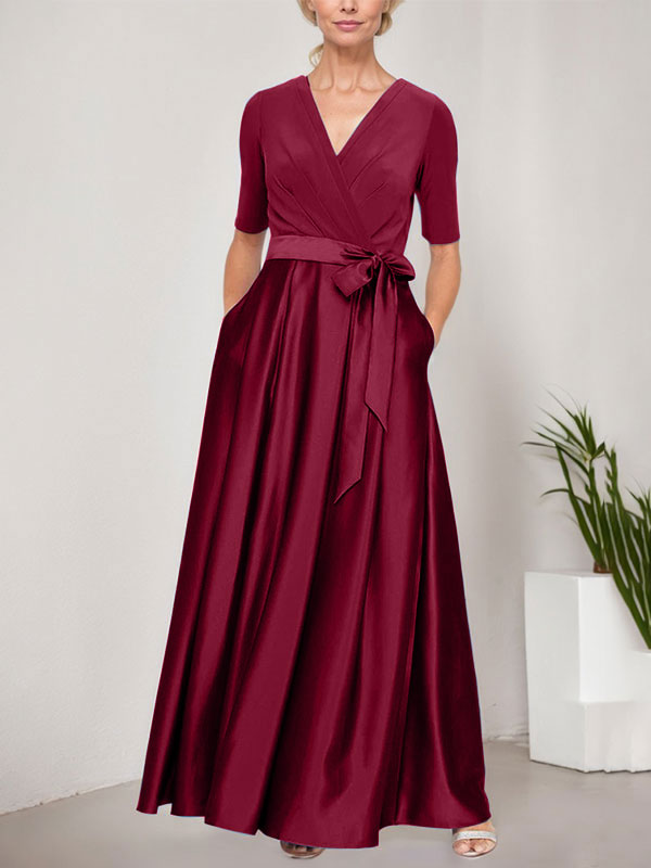 Vestido de gala con escote cruzado, falda de satén y corpiño de jersey