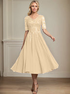 Vestido de gasa con encaje y lentejuelas para madre de la novia, corte A, escote en V y largo hasta la rodilla