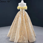Champagner A-Linie Trägerlos Sexy Abendkleider 2025 Schulterfrei Federn Glitzer Abendkleid HM67164 