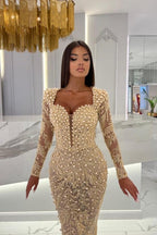 Champagnerfarbenes Meerjungfrau-Ballkleid mit langen Ärmeln und Herzausschnitt und Tüll-Überrock