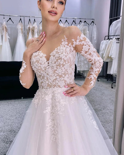 Vestido de novia encantador de corte A largo con apliques de tul y mangas largas