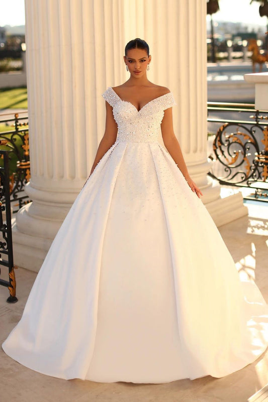 Encantador vestido de novia blanco largo con hombros descubiertos, corte A, lentejuelas y perlas