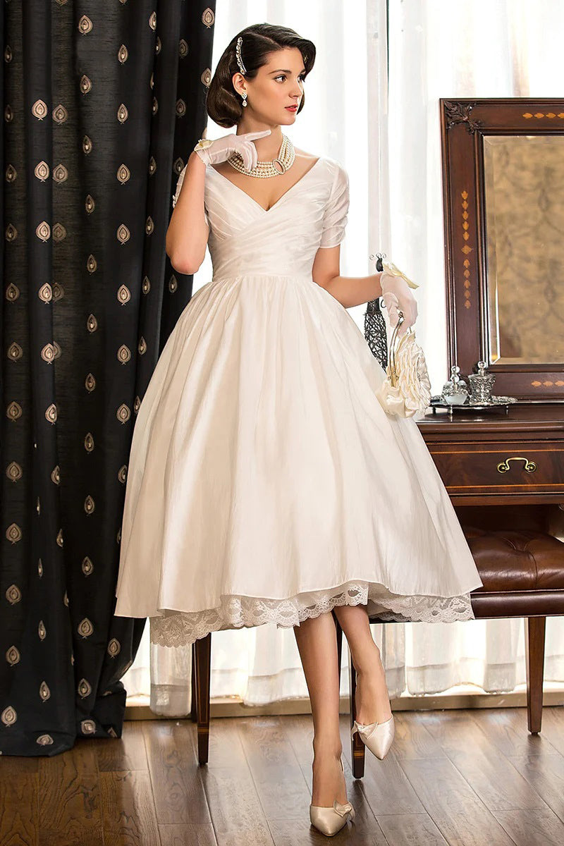 Vestido de novia clásico bohemio con escote en V, manga corta y pliegues WD677