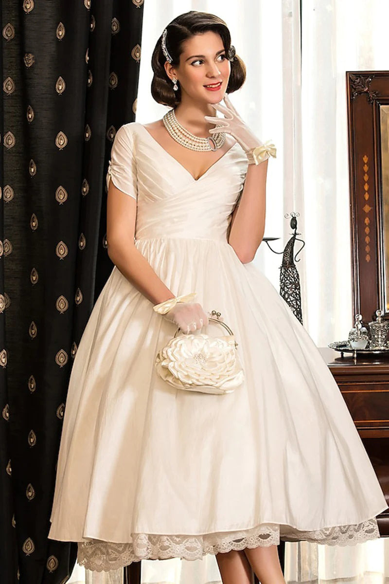 Vestido de novia clásico bohemio con escote en V, manga corta y pliegues WD677