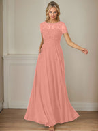 Vestido de gasa azul marino oscuro con escote barco, lentejuelas y corte en A