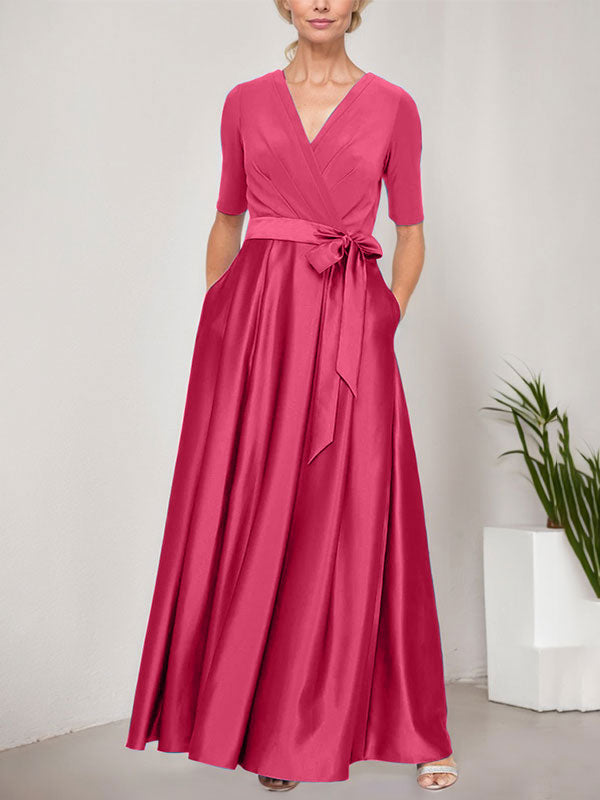 Vestido de gala con escote cruzado, falda de satén y corpiño de jersey