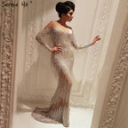 Im Angebot, keine Rückgabe, keine RückerstattungSale Dubai Champagne Langarm Sexy Abendkleider 2025 Perlen Quaste Elegante Meerjungfrau Formale Kleid LA6559