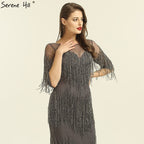 Im Angebot, keine Rückgabe, keine RückerstattungSale Dubai Champagne Langarm Sexy Abendkleider 2025 Perlen Quaste Elegante Meerjungfrau Formale Kleid LA6559