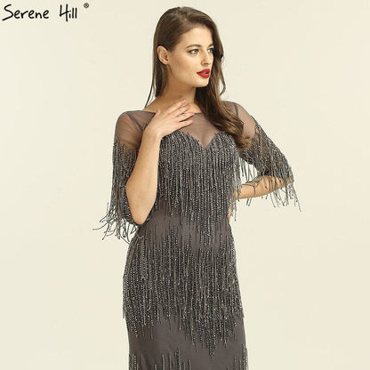 En oferta sin devolución sin reembolsoVenta Dubai Champagne Langarm Sexy Abendkleider 2025 Perlen Quaste Elegante Meerjungfrau Formale Kleid LA6559