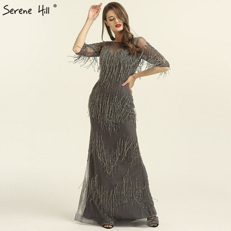 Im Angebot, keine Rückgabe, keine RückerstattungSale Dubai Champagne Langarm Sexy Abendkleider 2025 Perlen Quaste Elegante Meerjungfrau Formale Kleid LA6559