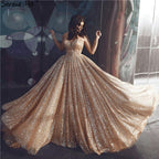 Vestidos de noche sexys con brillo y espalda descubierta en dorado de Dubái 2025, vestidos de noche playeros de lujo sin mangas LA60854 