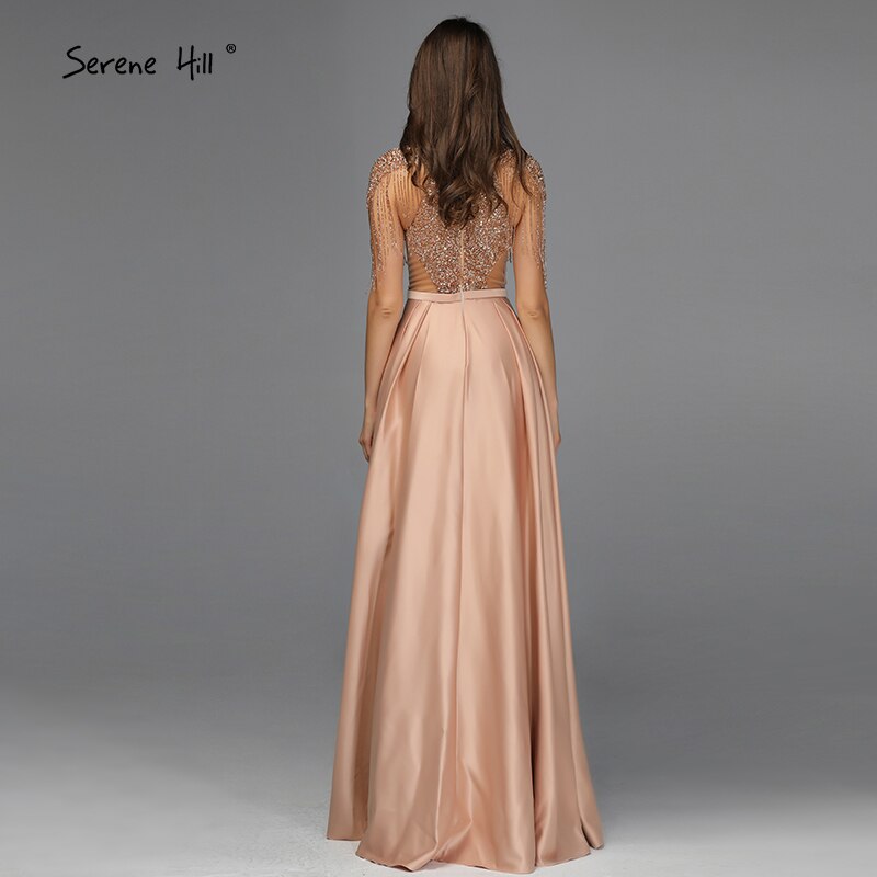 Vestidos de fiesta de Dubái dorados con cuello alto y brillantes, sin mangas, con borlas y cuentas, corte A, diseño LA60998 
