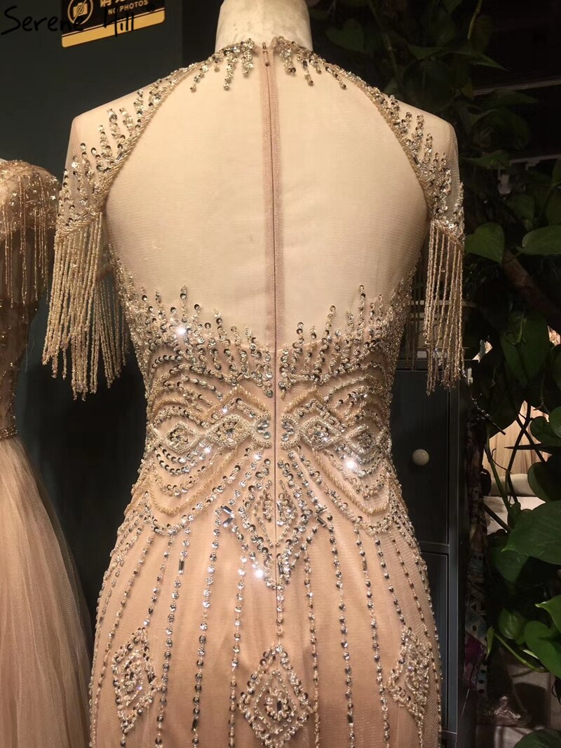 Vestido de noche de lujo estilo sirena color nude de Dubái, cuello redondo, manga corta, apliques de cuentas y borlas, LA70646 