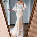 Vestidos de novia sexys de sirena blanca con escote nude en Dubái 2025, con mangas farol y flores y cuentas, LA70417, hechos a medida