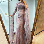 Vestido de noche de lujo estilo sirena rosa de Dubái 2025, manga larga, con cuentas de cristal, vestido formal LA70595 