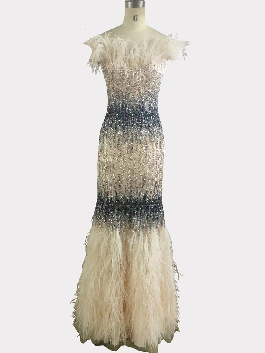 Vestidos de noche de sirena sexys de color rosa de Dubái, diseño de lujo con plumas de cristal, sin mangas, vestidos formales 2025 LA70242 