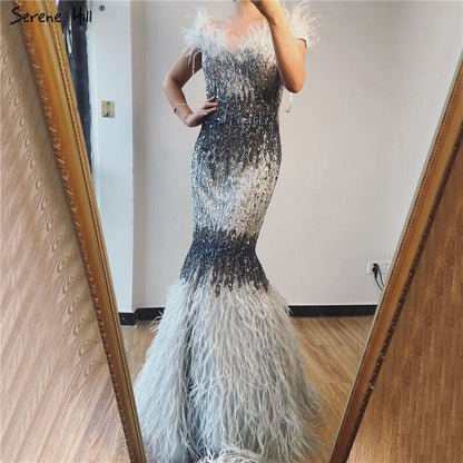 Dubai Rosa Sexy Meerjungfrau Abendkleider Design Luxus Kristall Federn Ärmellose Abendkleider 2025 LA70242 