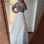 Vestidos de noche de lujo blancos de Dubái con mangas largas 2025, escote en V, sexys, con lentejuelas y capas, LA6574 