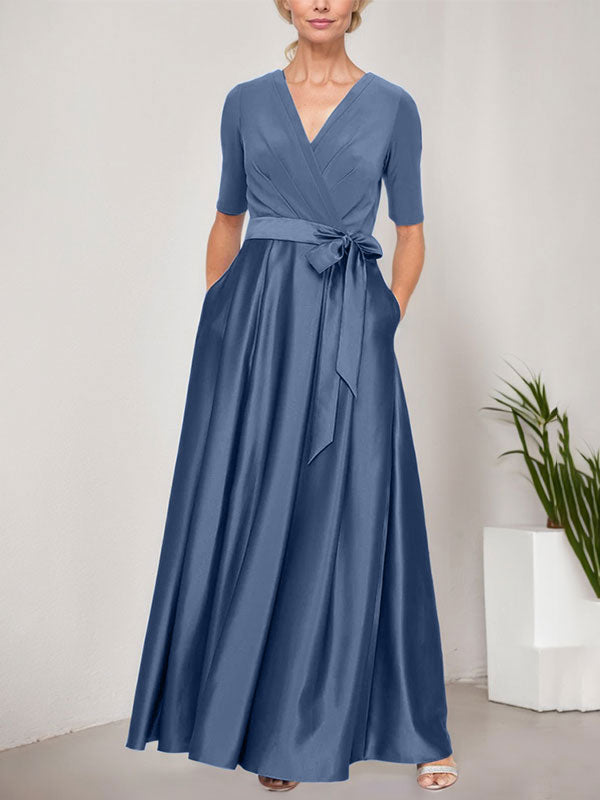 Vestido de gala con escote cruzado, falda de satén y corpiño de jersey
