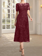 Vestido de madre de la novia de encaje con lentejuelas, corte A, escote ilusión y largo hasta la rodilla