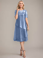 Vestido de madre de la novia con corte en A, escote redondo y largo hasta la rodilla, con apliques y lentejuelas