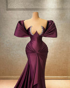 Elegante vestido de fiesta largo de satén con volantes, hombros descubiertos y mangas cortas en forma de A