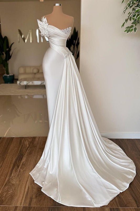 Elegantes langes elfenbeinfarbenes ärmelloses Meerjungfrau-Ballkleid aus Satin mit Perlen