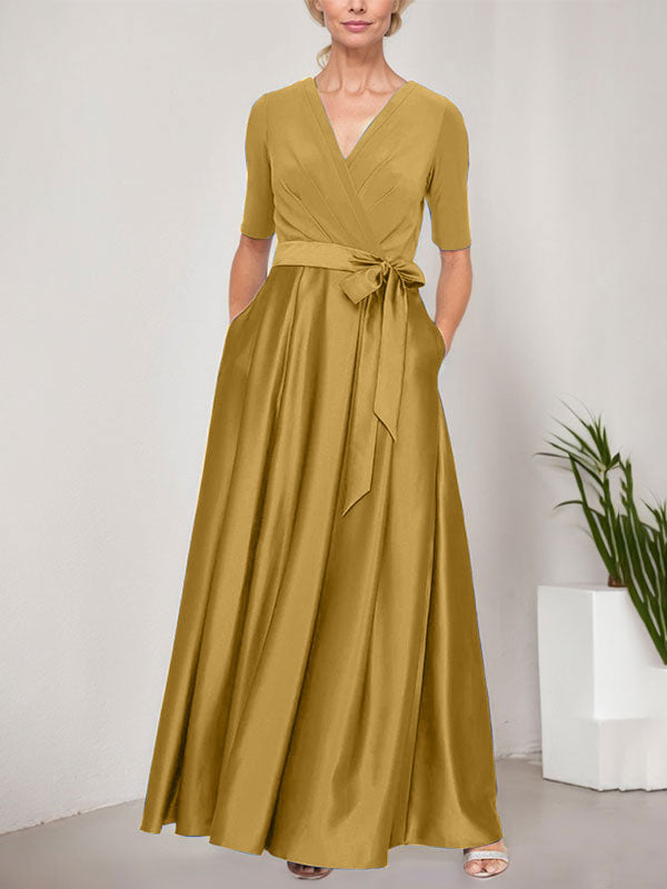Vestido de gala con escote cruzado, falda de satén y corpiño de jersey
