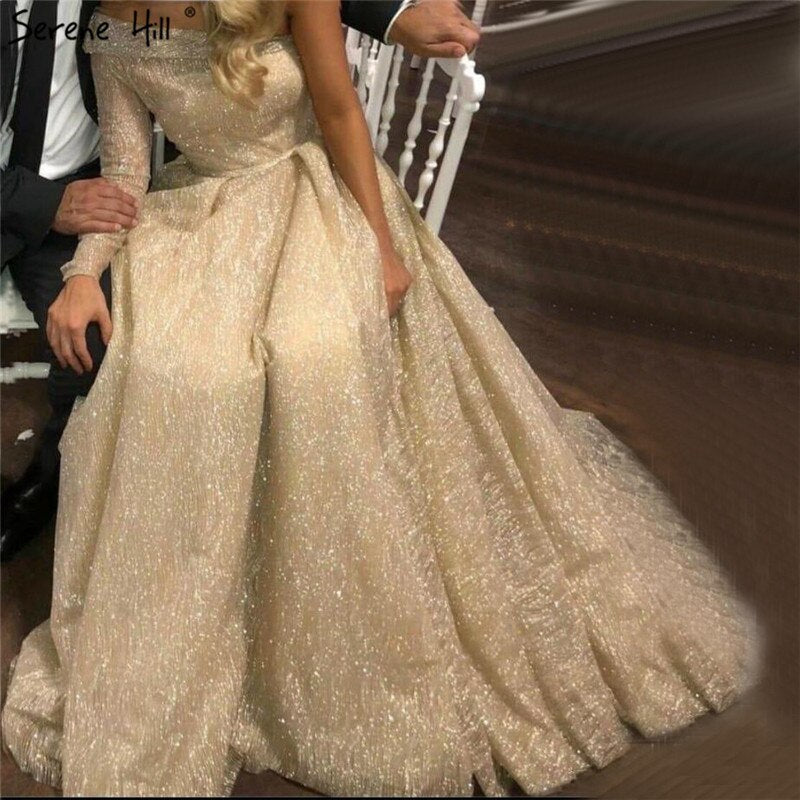 En oferta, sin devolución ni reembolso. Vestidos de noche Dubai sexys dorados de un solo hombro 2025, mangas largas, vestido formal de lujo con brillo en forma de A LA70329 