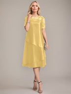 Vestido de madre de la novia con corte en A, escote redondo y largo hasta la rodilla, con apliques y lentejuelas